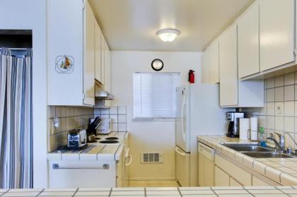 Oceanfront Condo Escape with Grill Walk to Beach! - image 11