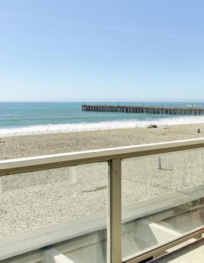 Oceanfront Condo Escape with Grill Walk to Beach! - image 12