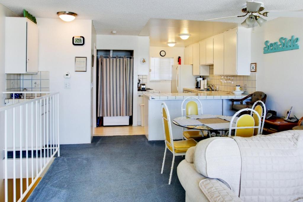 Oceanfront Condo Escape with Grill Walk to Beach! - image 5