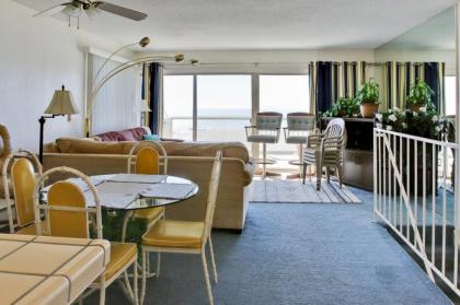 Oceanfront Condo Escape with Grill Walk to Beach! - image 7