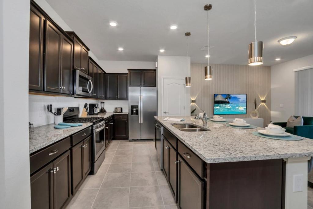 Imagine Your Family Renting This Luxury Home on Solterra Resort Orlando Townhome 5058 - main image