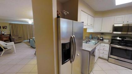 Unit 114 - Enjoy the walk-out balcony and FREE BEACH SERVICE - image 2