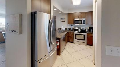 Islander 610 - Newly updated - Sunset views of Gulf and Harbor - FREE beach service - image 3