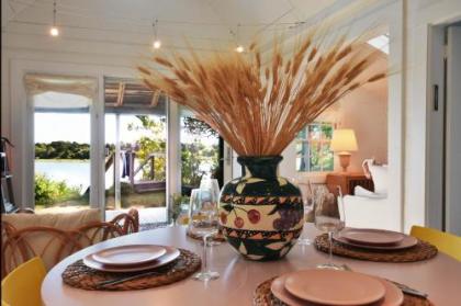 457 Waterfront Retreat with Private Beach Landing Covered Deck SUP Boards