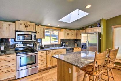 Lakefront Cabin with Stunning Mountain Views and Dock! - image 5