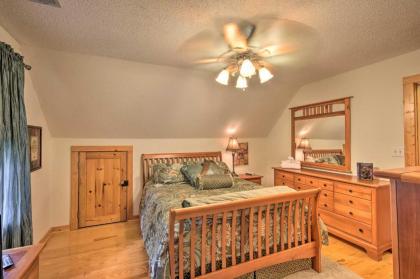 Spacious Riverfront Retreat with Deck and Hot Tub - image 11