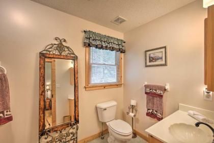 Spacious Riverfront Retreat with Deck and Hot Tub - image 12