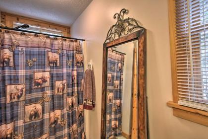 Spacious Riverfront Retreat with Deck and Hot Tub - image 13