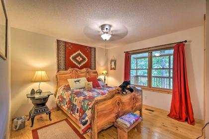 Spacious Riverfront Retreat with Deck and Hot Tub - image 14