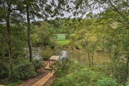 Spacious Riverfront Retreat with Deck and Hot Tub - image 2