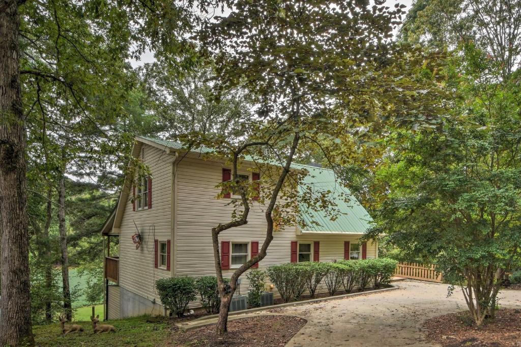 Spacious Riverfront Retreat with Deck and Hot Tub - image 3