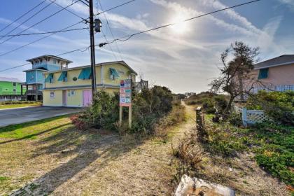 Colorful Cottage with Patio Across from the Beach! - image 2