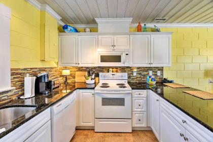 Colorful Cottage with Patio Across from the Beach! - image 3
