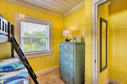 Colorful Cottage with Patio Across from the Beach! - image 4
