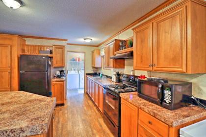 Lakefront Greers Ferry Cabin with Covered Boat Slip! - image 9