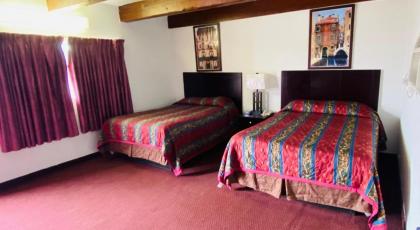 Budget Inn & Suites - image 10