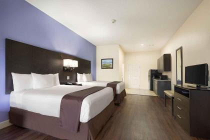Days Inn & Suites by Wyndham Galveston West/Seawall - image 3