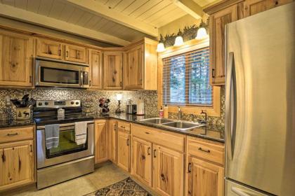 Tranquil Lake Cottage with Hot Tub Near Golf! - image 7