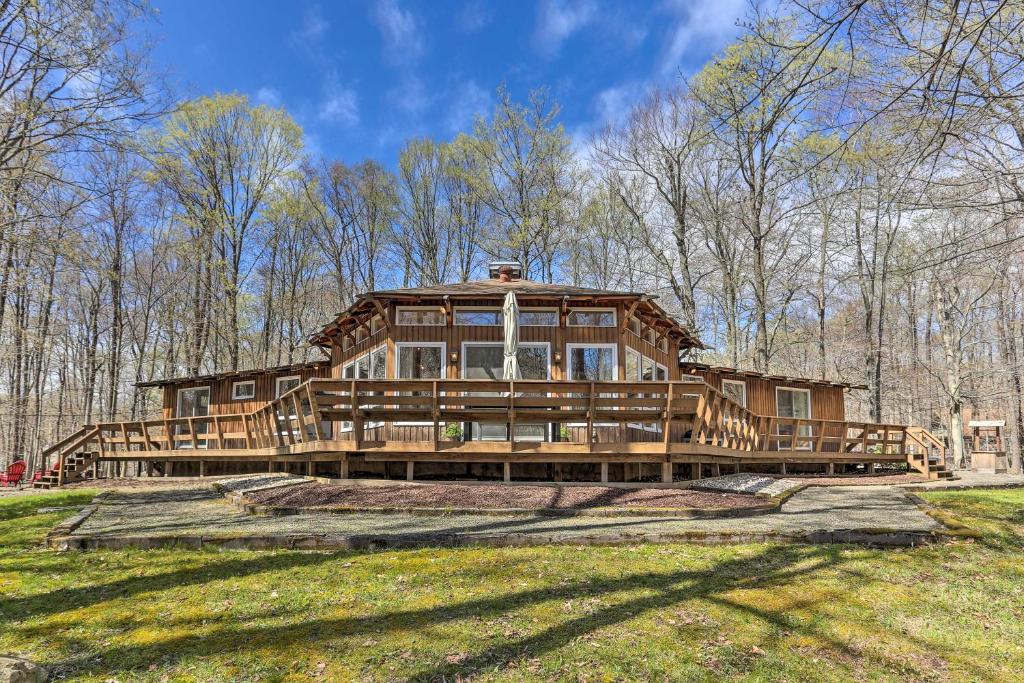 Family Home with Deck Walk to Big Bass Lake! - main image