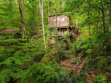 the treeHouse   Rocking Chair Deck with Hot tub below Walking Distance to Downtown Helen Sleeps 5 Helen