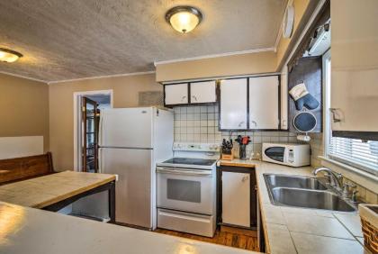 Cottage with Fire Pit Walk to Park and Houghton Lake! - image 13
