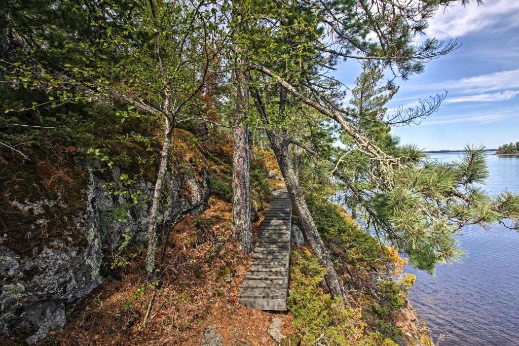Cozy Stop Island Cabin with Boat Dock and Beach! - main image