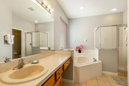 Tiger Lilly- 6 bedroom vacation home in the Disney area with a private pool and hot tub with a spacious patio - image 13