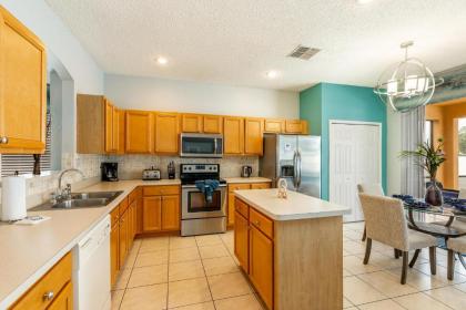 Tiger Lilly- 6 bedroom vacation home in the Disney area with a private pool and hot tub with a spacious patio - image 3