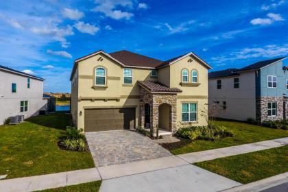 Brand New 9 Bedrooms House with private pool Star Wars Game Room theme Rooms and Lake View SA2145 Kissimmee Florida