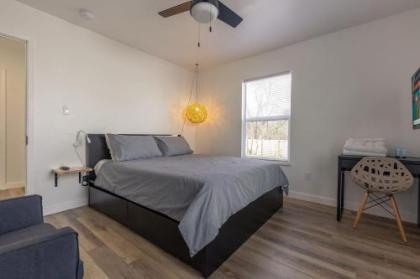 Modern minimalist comfort 5 minutes from downtown - image 3
