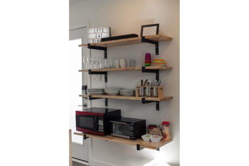 Modern minimalist comfort 5 minutes from downtown - image 5