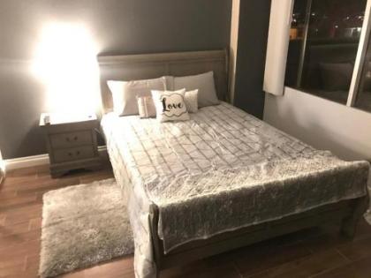 Amazing Spare Bedroom in Shared 2B Condo behind Convention Center