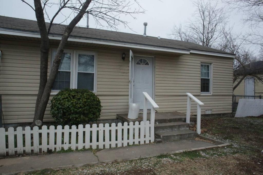 1 bedroom with a fireplace close to base - main image