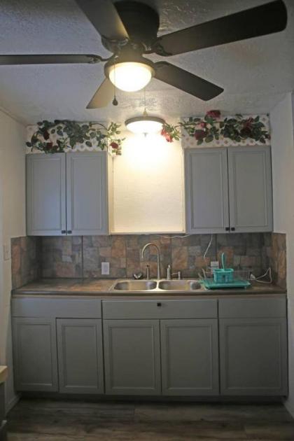 1 bedroom with a fireplace close to base - image 10
