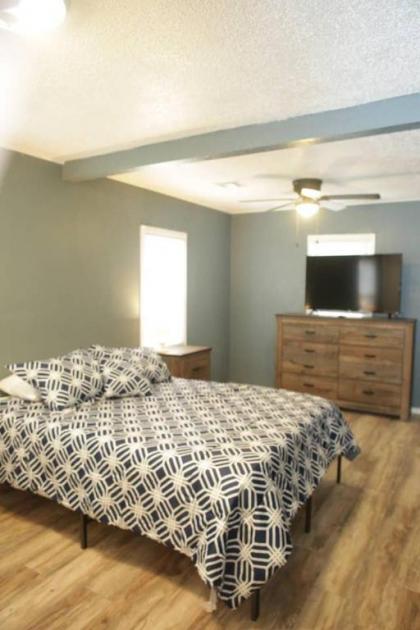 1 bedroom with a fireplace close to base - image 15