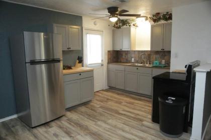 1 bedroom with a fireplace close to base - image 5
