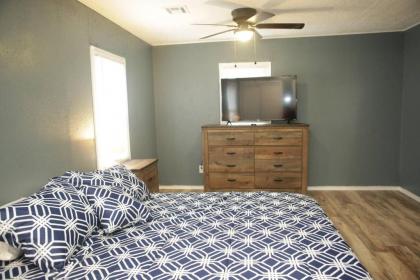 1 bedroom with a fireplace close to base - image 7