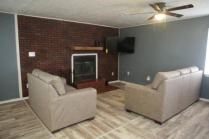 1 bedroom with a fireplace close to base - image 8