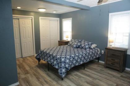 1 bedroom with a fireplace close to base - image 9