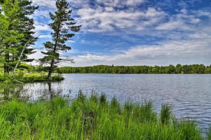 Burns Lake Cabin with Dock Fire Pit Rowboat and More! - image 8