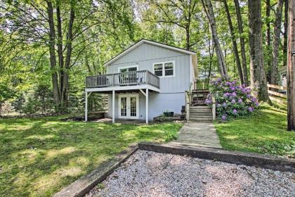 Ludington Cottage with Deck Yard and Fire Pit!