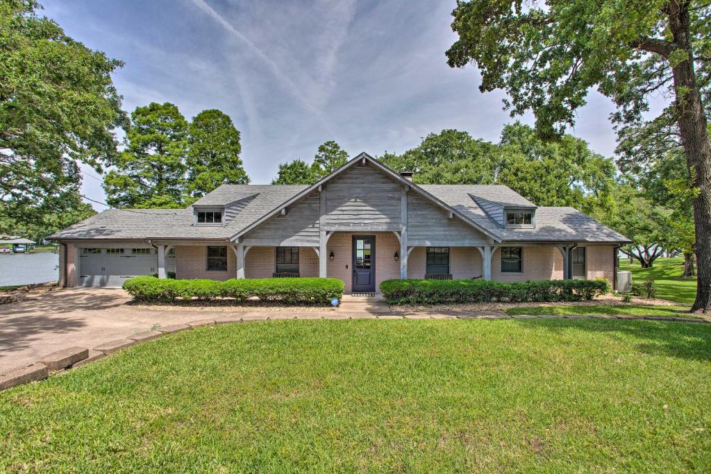 Upscale Lakefront Home with Boat Dock and Decks! - main image