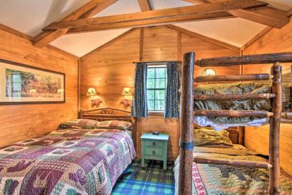 Nature Lovers Dream Cabin with Fire Pit and Deck - image 11