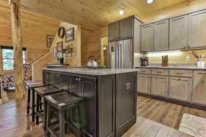 TAKE IT EASY in this Custom designed luxury log cabin is located in quiet area on paved road. - image 18