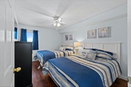 Windy Hill Dunes 1302 - Elegant oceanfront condo with hardwood floors and a lazy river - image 13