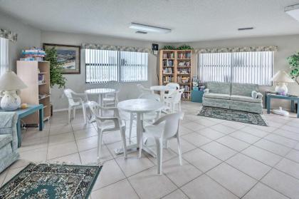 Coastal Condo with Patio Swim Golf and Explore! - image 11
