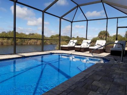 Stunning BRAND NEW 3 bed home fabulous pool overlooking river Florida