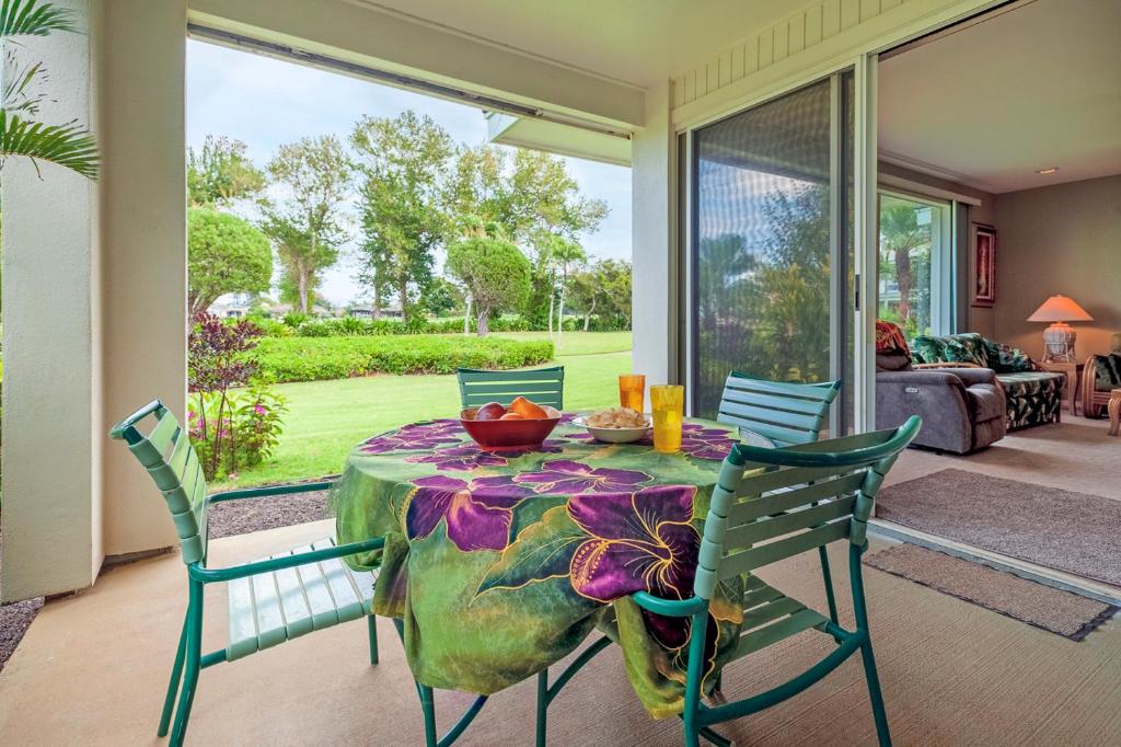 Emmalani 411 - AC spacious golf course view close to beach! - main image