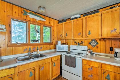 Lakefront Manistique Cabin with Private Dock and Fire Pit - image 7