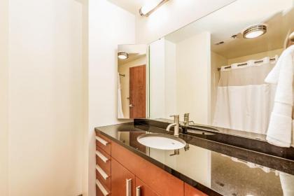 TWO Stunning Industrial Lofts by CozySuites - image 13